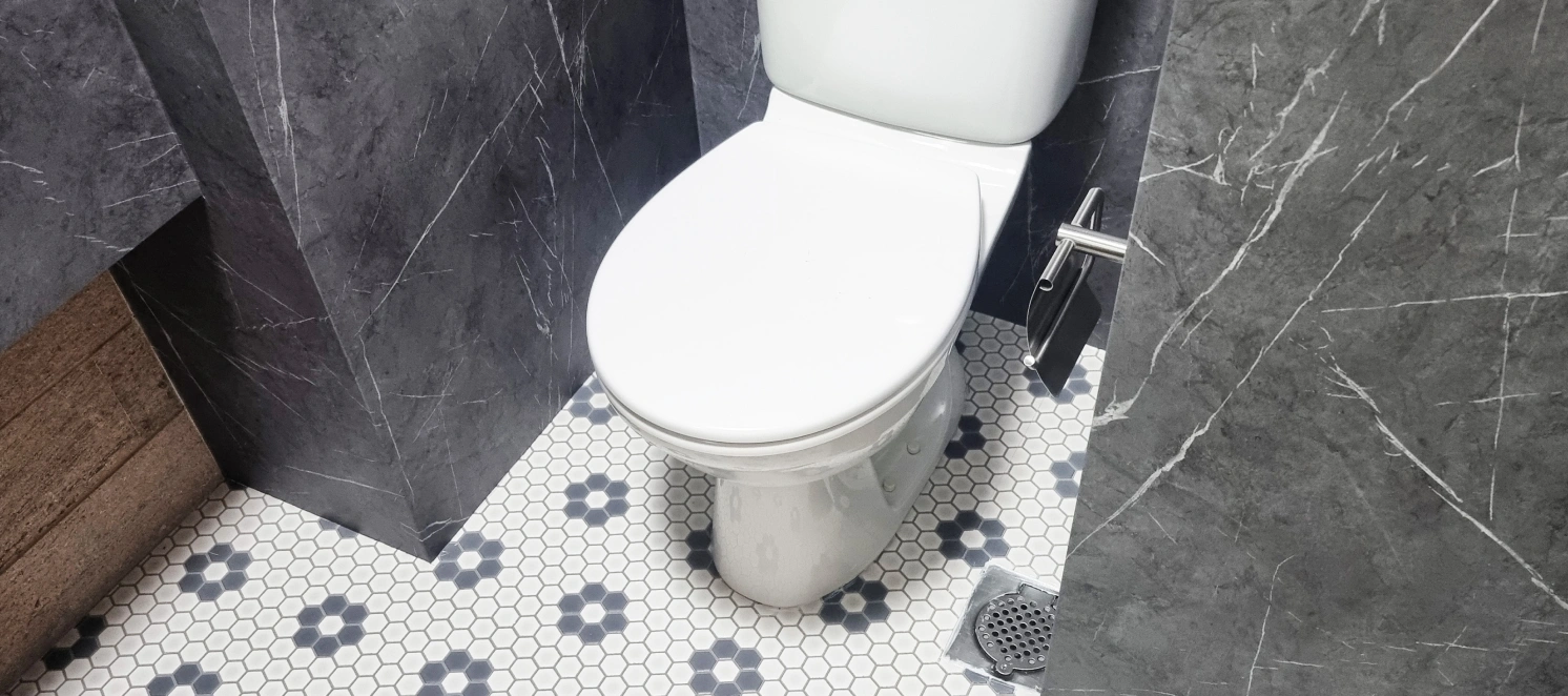 Installation of wallpaper and floor at bathroom area